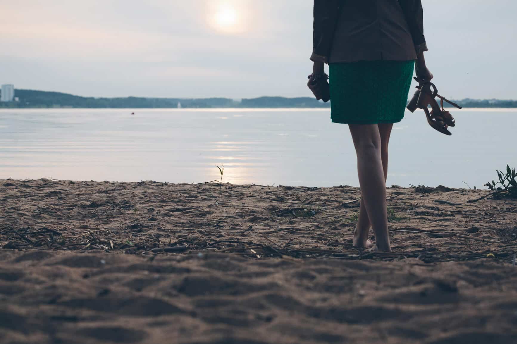 barefoot woman on beach